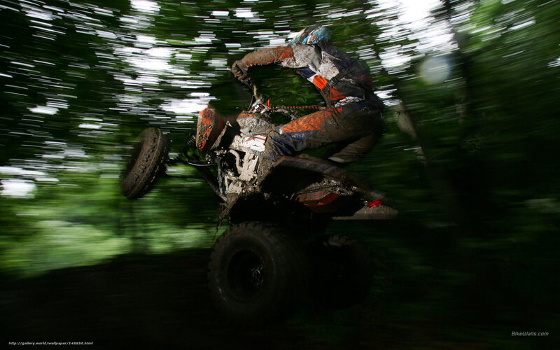 Rider on Muddy ATV