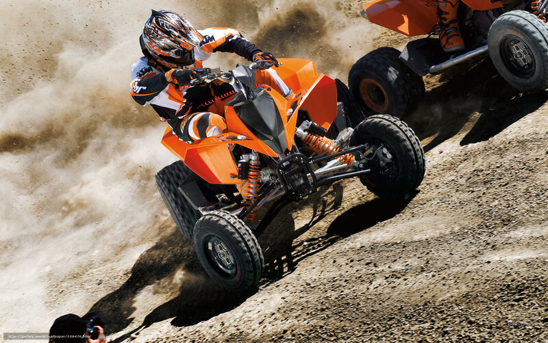 Rider on Orange ATV — Dynamic, Afternoon, Photograph
