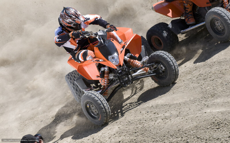 Rider on Orange ATV — Dynamic