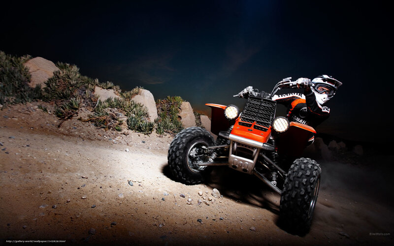 Rider on Orange ATV