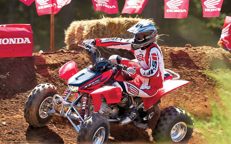 Rider on Red ATV — Action-packed, Afternoon