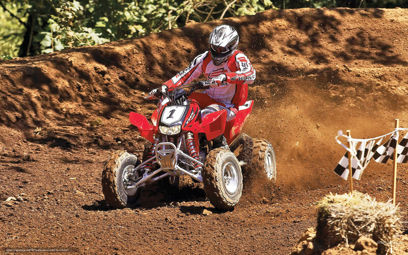 Rider on Red ATV — Dynamic, Afternoon, Photograph