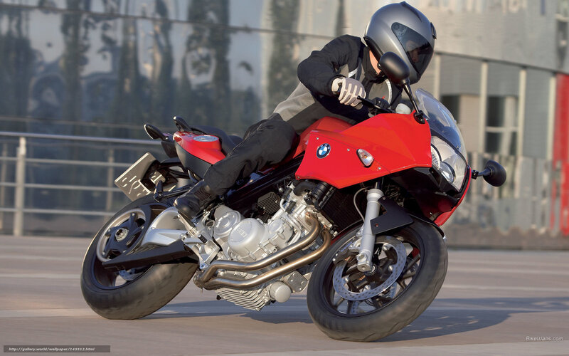 Rider on red BMW motorcycle