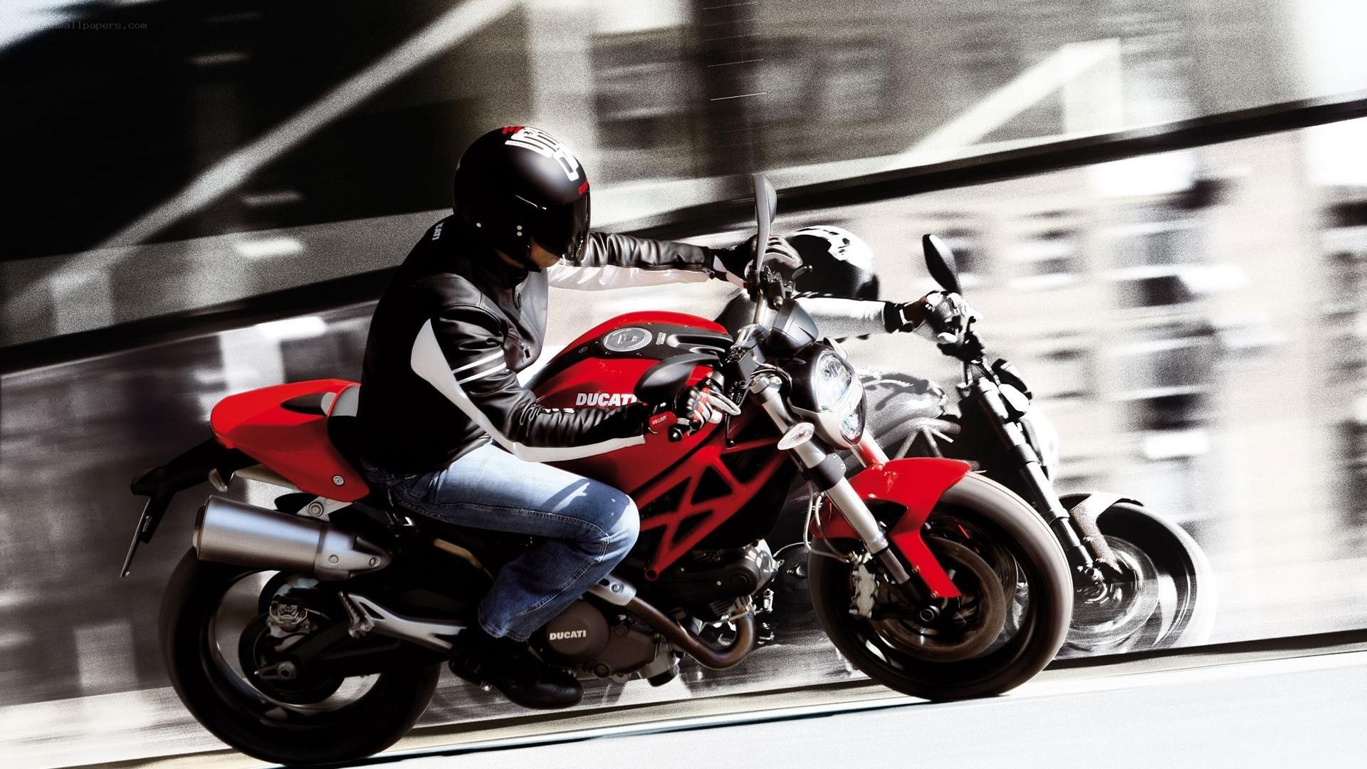 Rider on red Ducati motorcycle