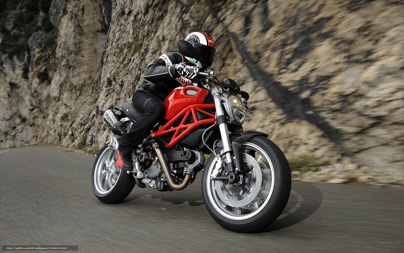 rider on red motorcycle