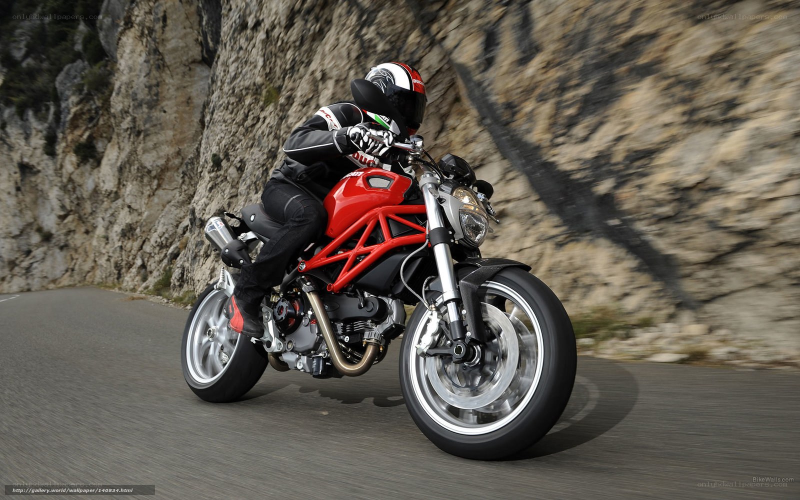 rider on red motorcycle