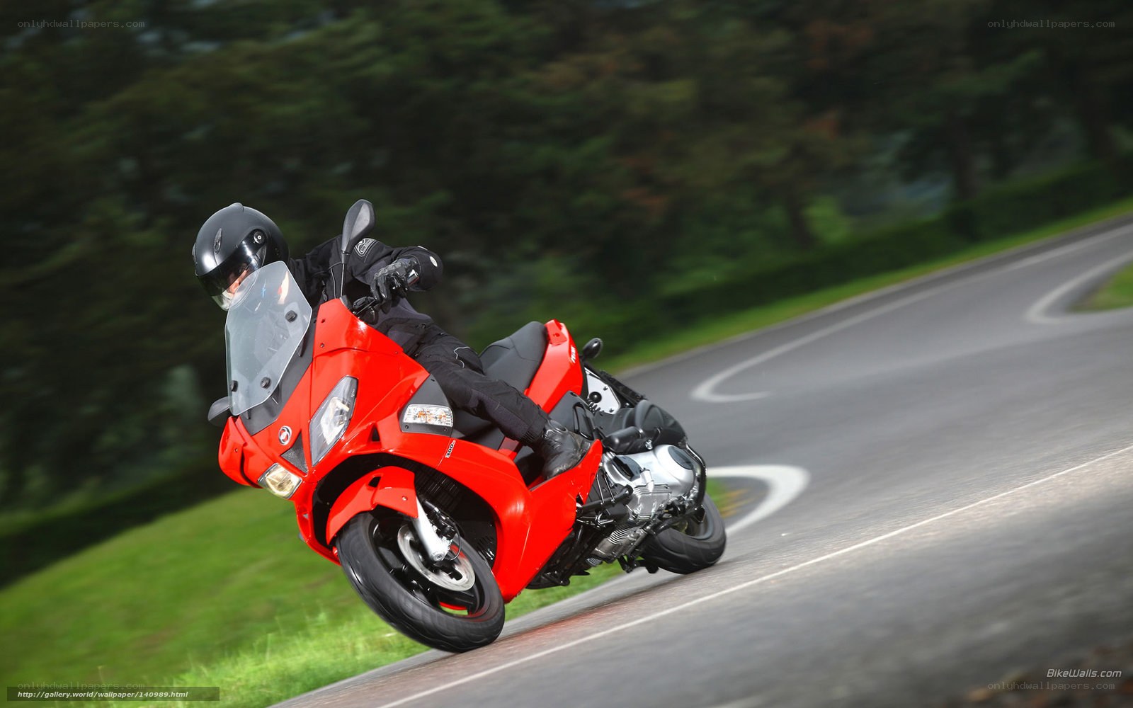 rider on red motorcycle