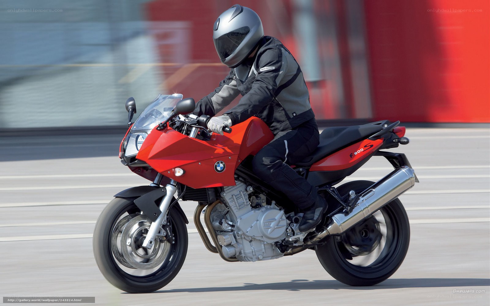 rider on red motorcycle