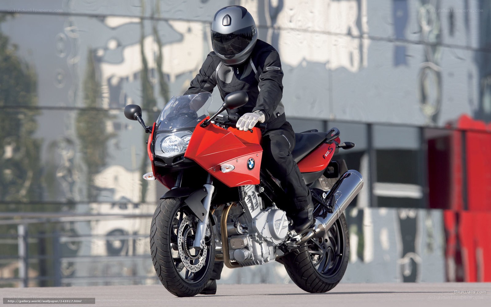 rider on red motorcycle