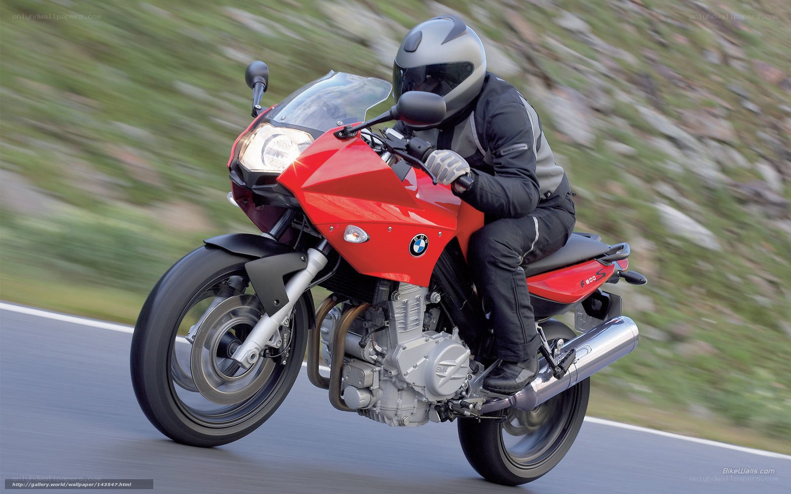rider on red motorcycle
