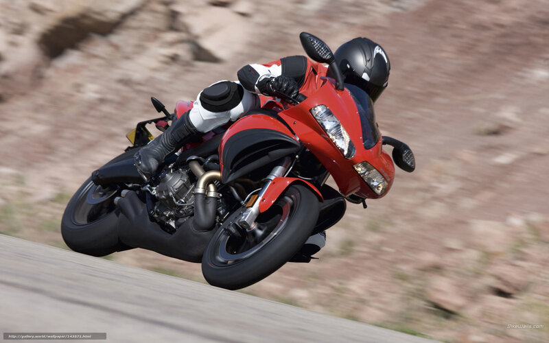 rider on red motorcycle