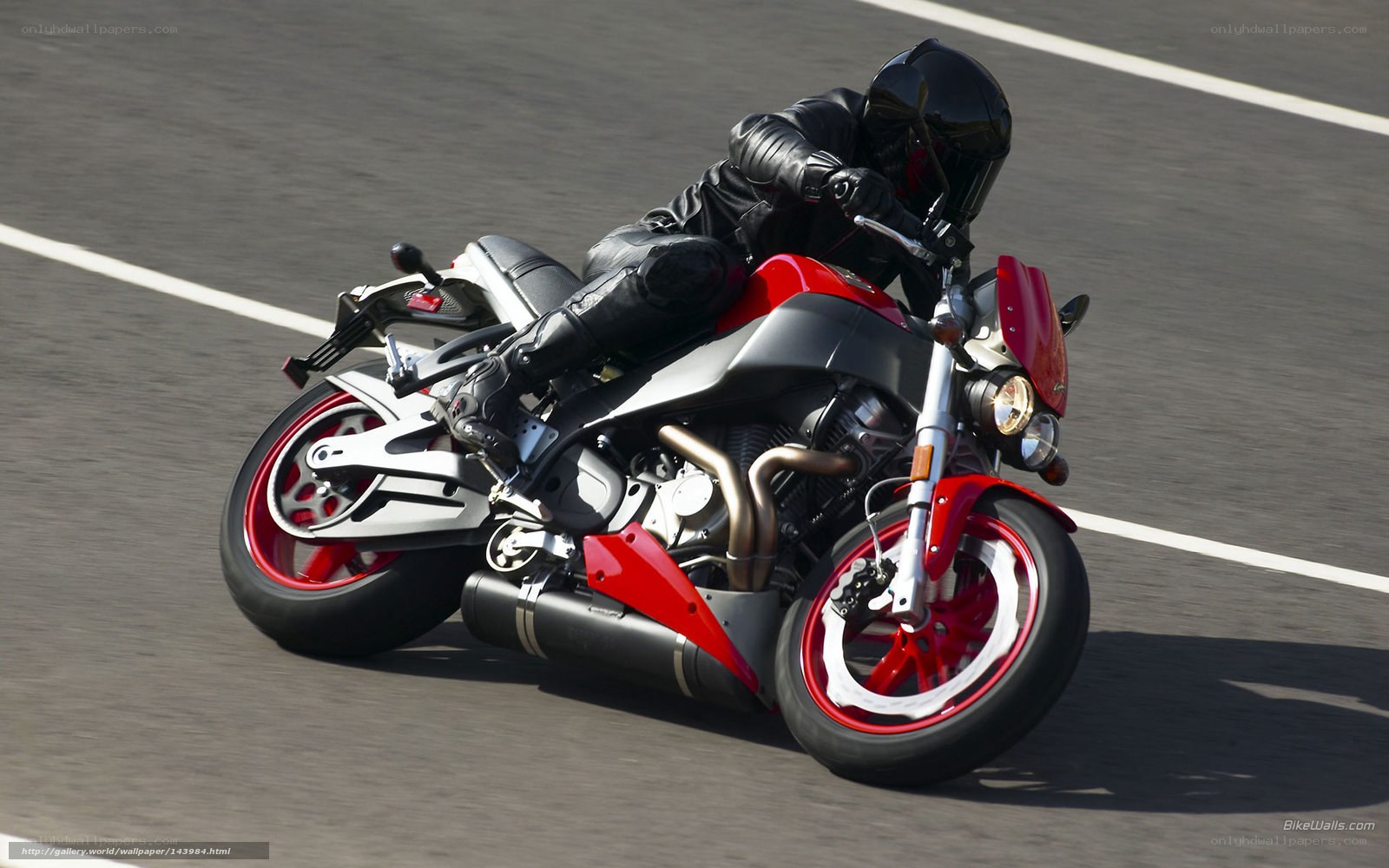 rider on red motorcycle