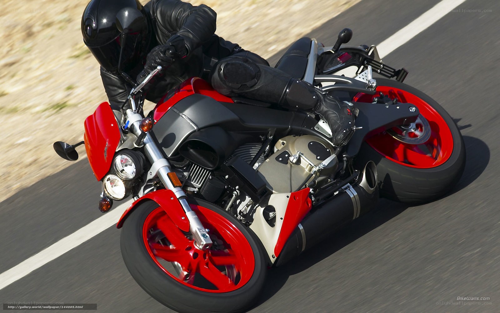 rider on red motorcycle