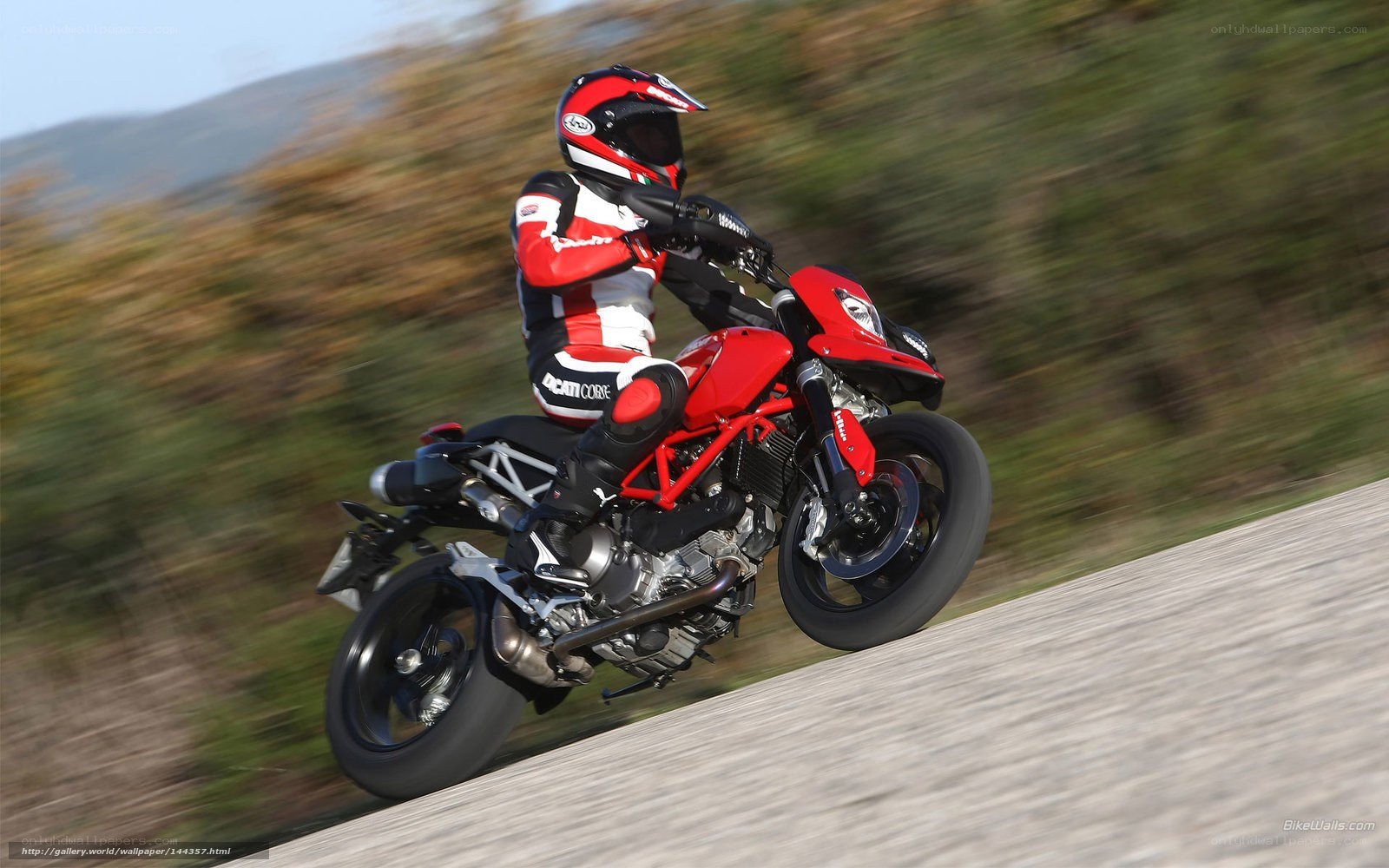 rider on red motorcycle