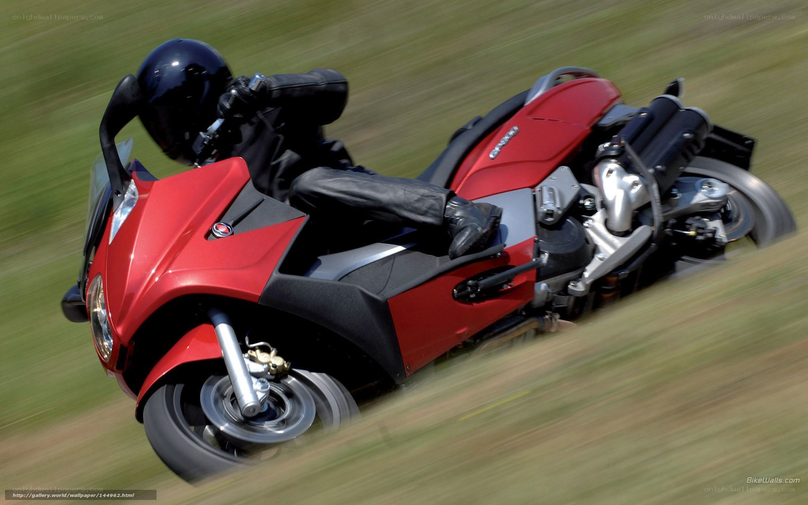 rider on red motorcycle