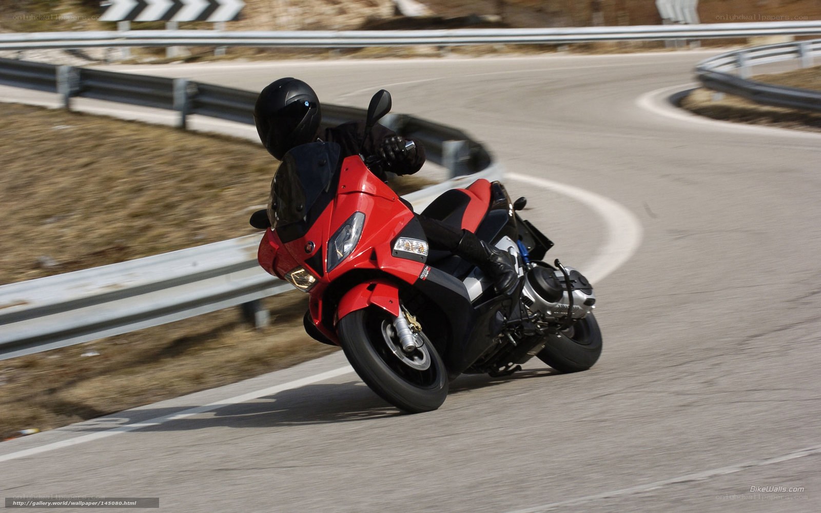 rider on red motorcycle