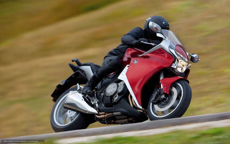 rider on red motorcycle
