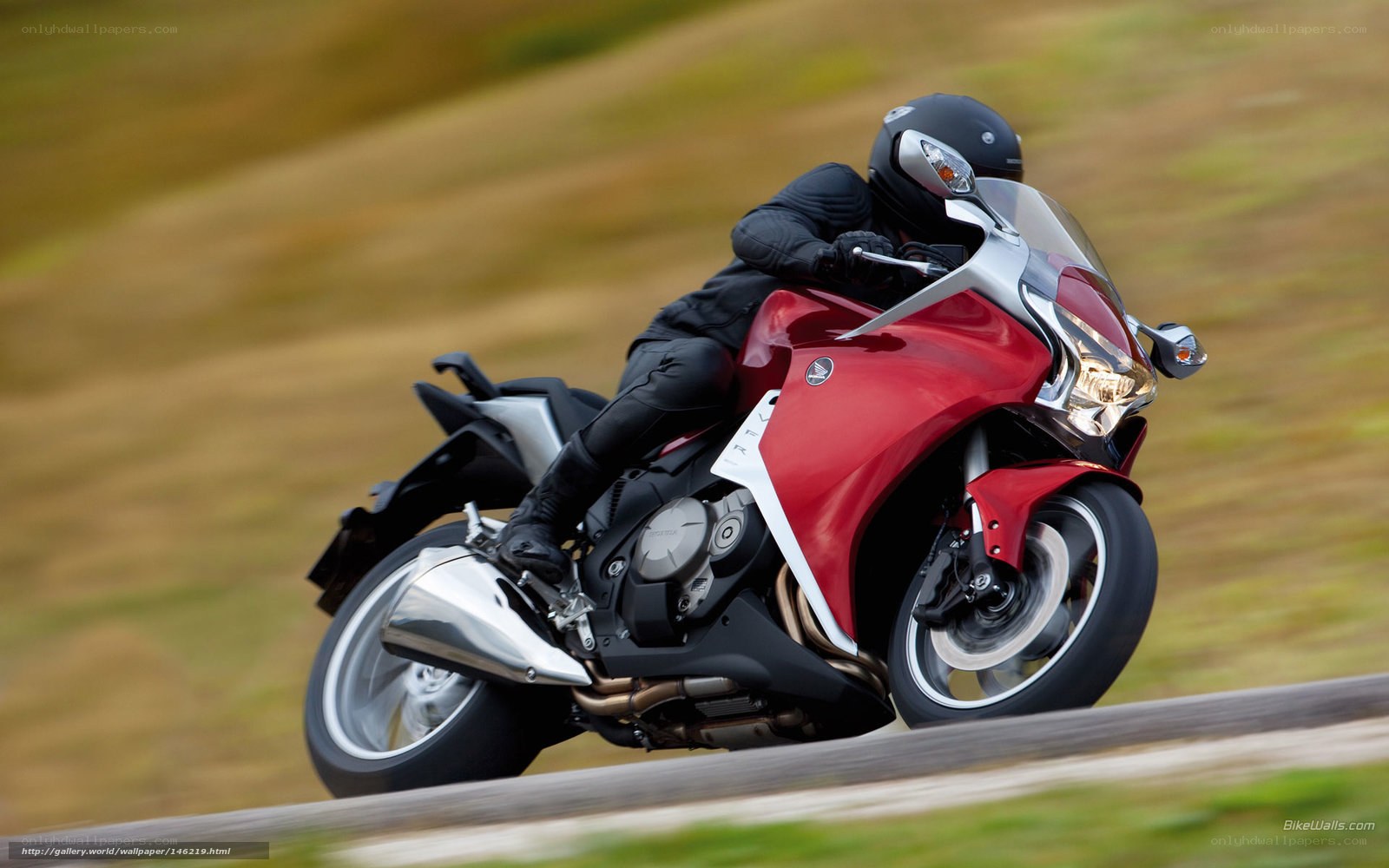 rider on red motorcycle
