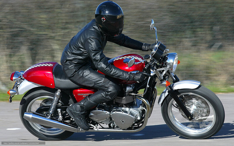rider on red motorcycle