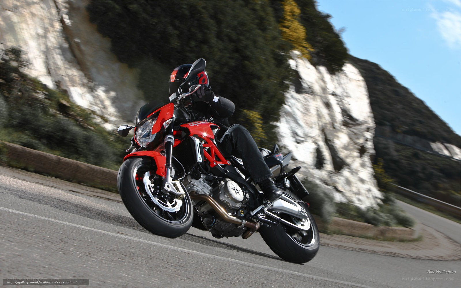 rider on red motorcycle