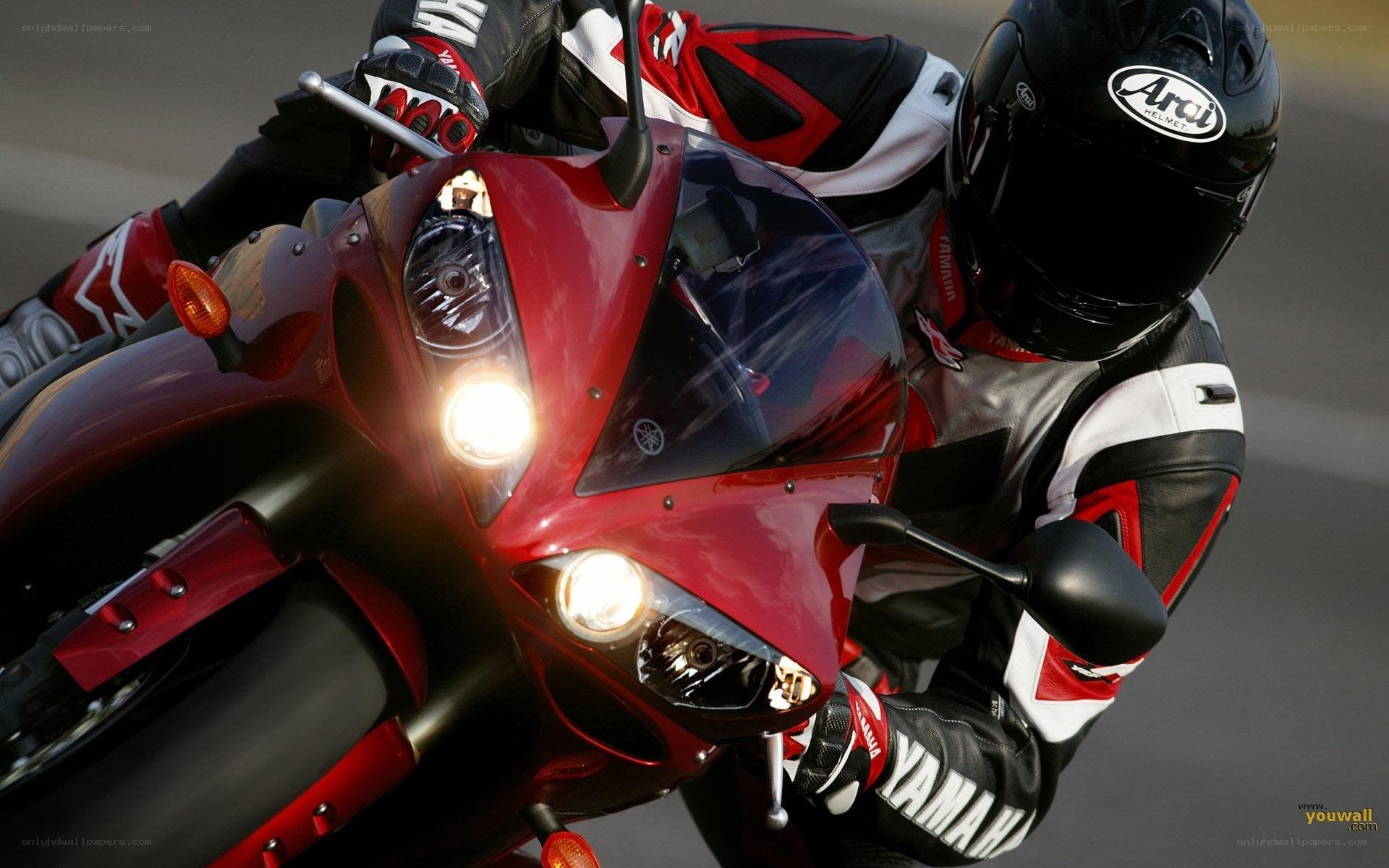 rider on red motorcycle