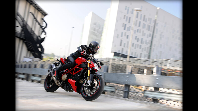 rider on red motorcycle