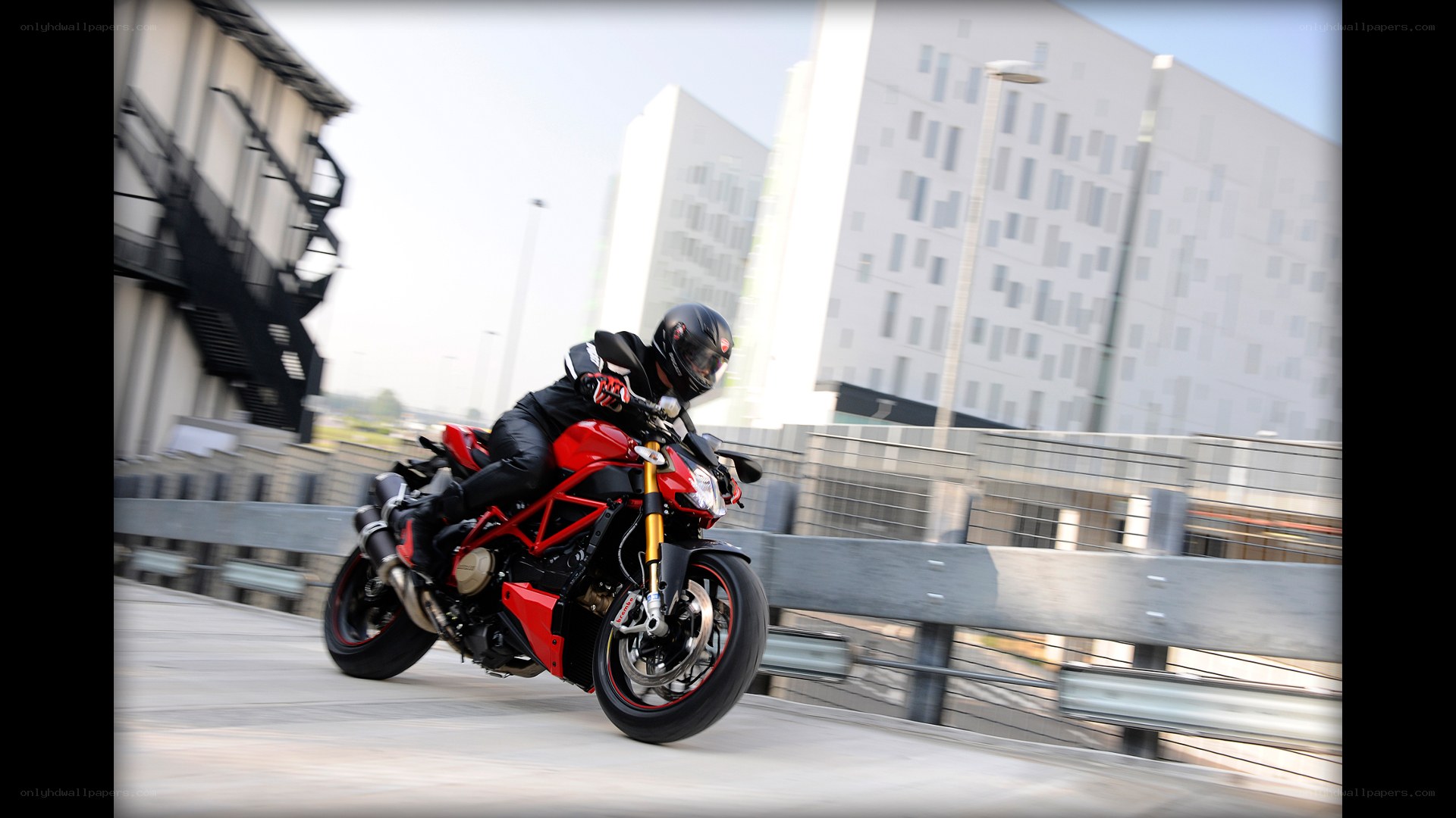 rider on red motorcycle
