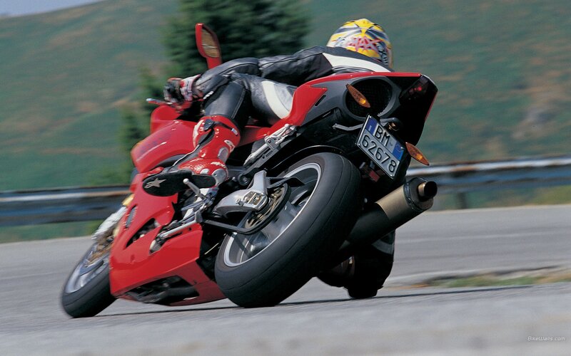 rider on red motorcycle