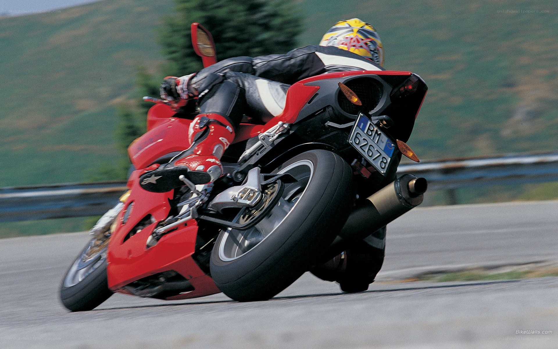 rider on red motorcycle