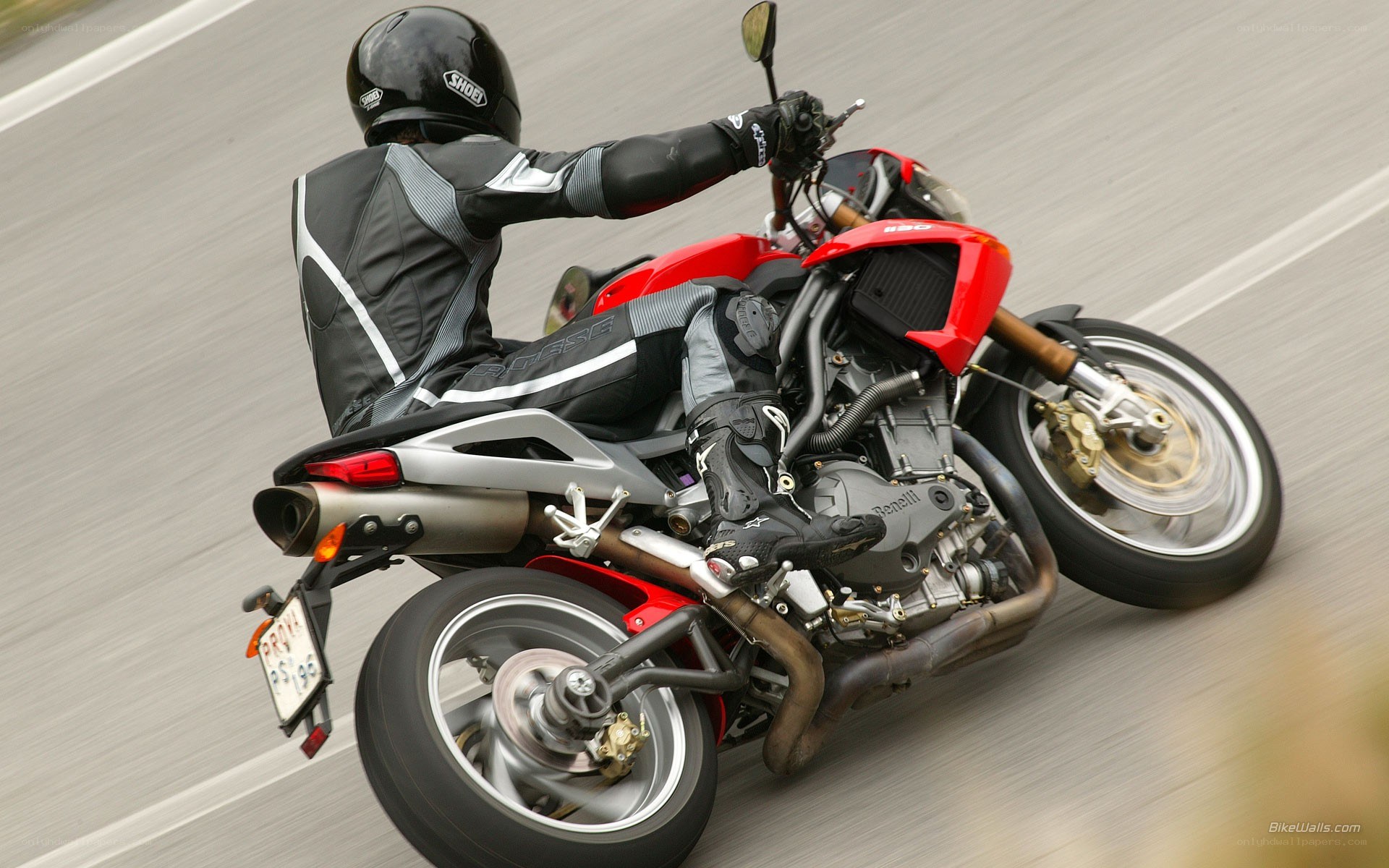 rider on red motorcycle