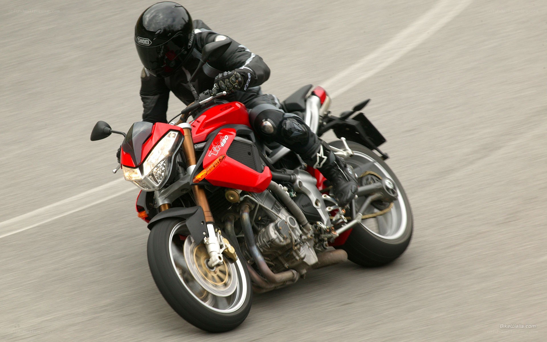 rider on red motorcycle