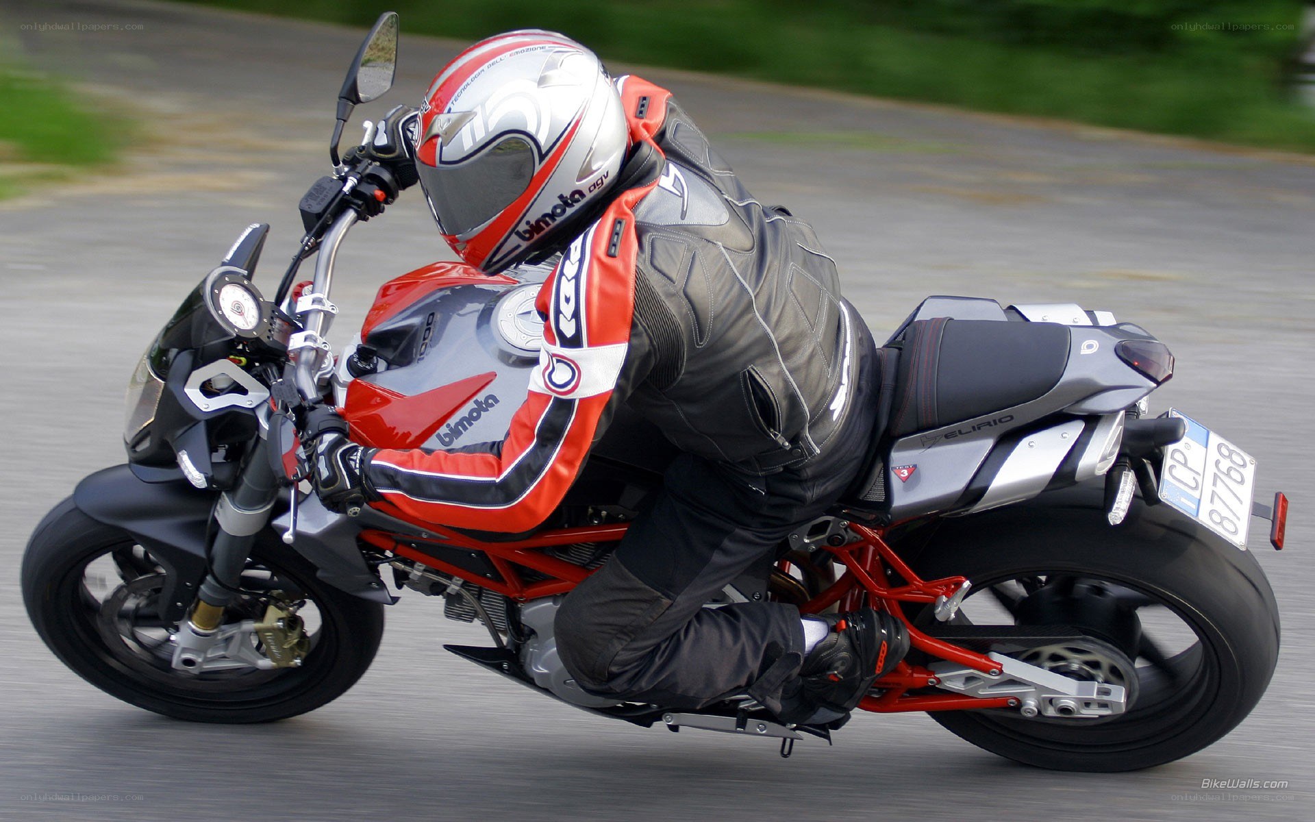 rider on red motorcycle