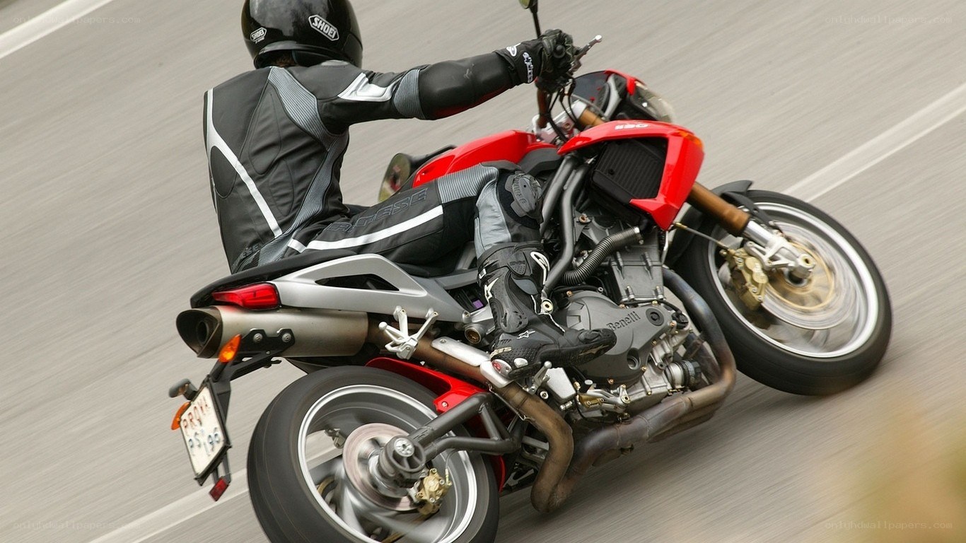 rider on red motorcycle