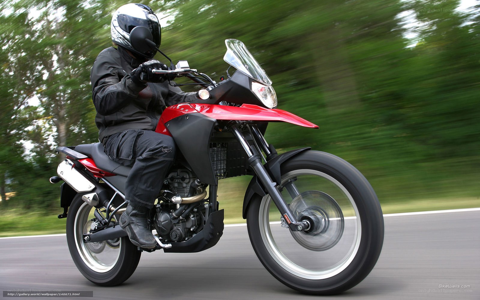 rider on red motorcycle