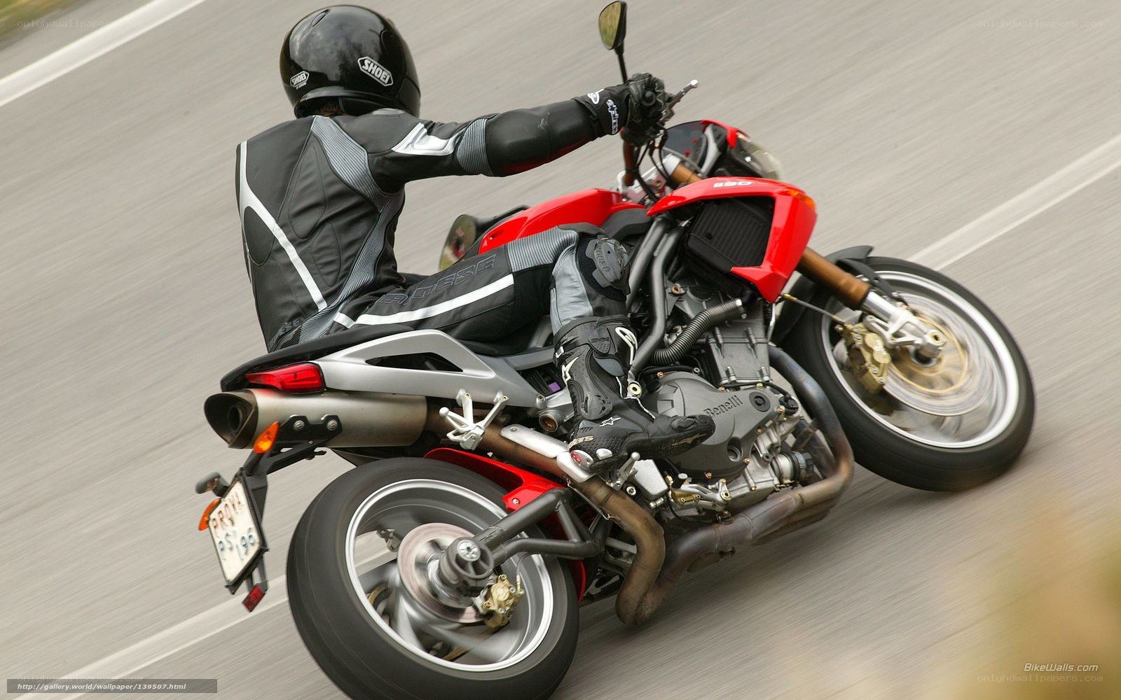 rider on red motorcycle