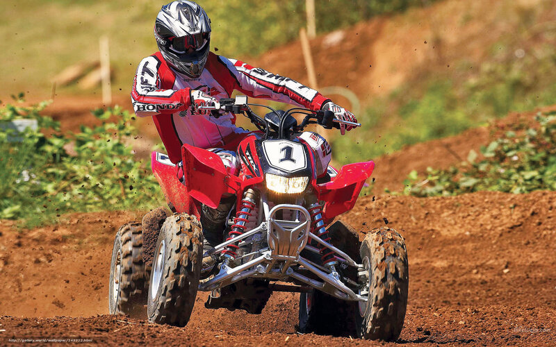Rider on Red Quad Bike — Action