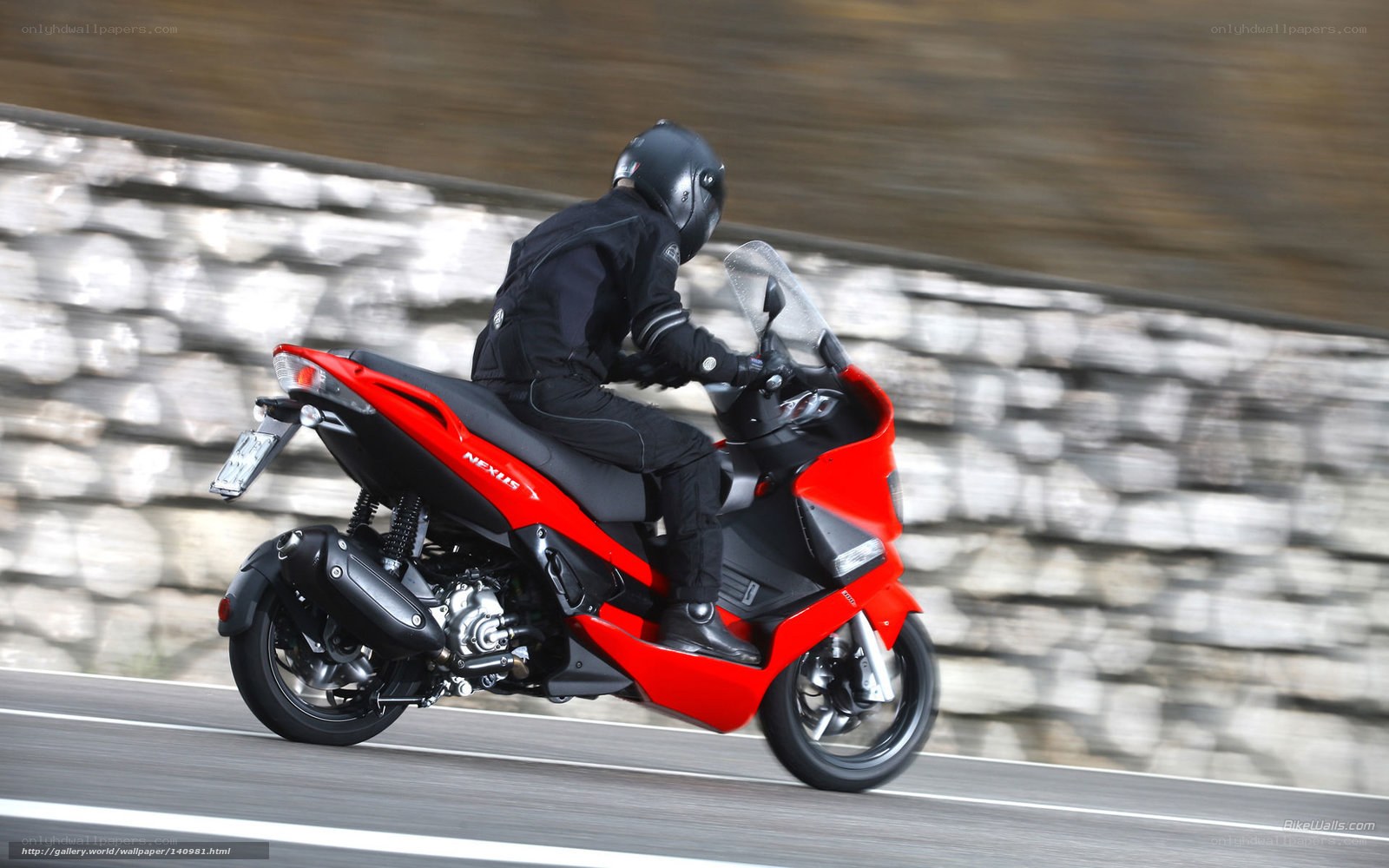 rider on red scooter