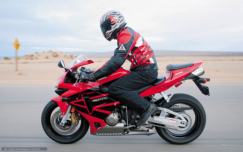 Rider on red sport motorcycle
