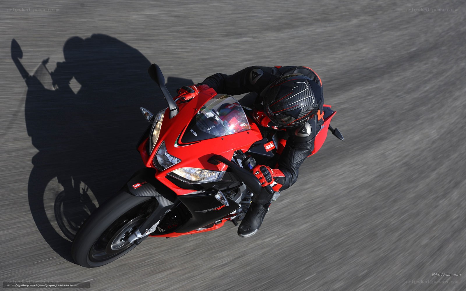 rider on red sport motorcycle