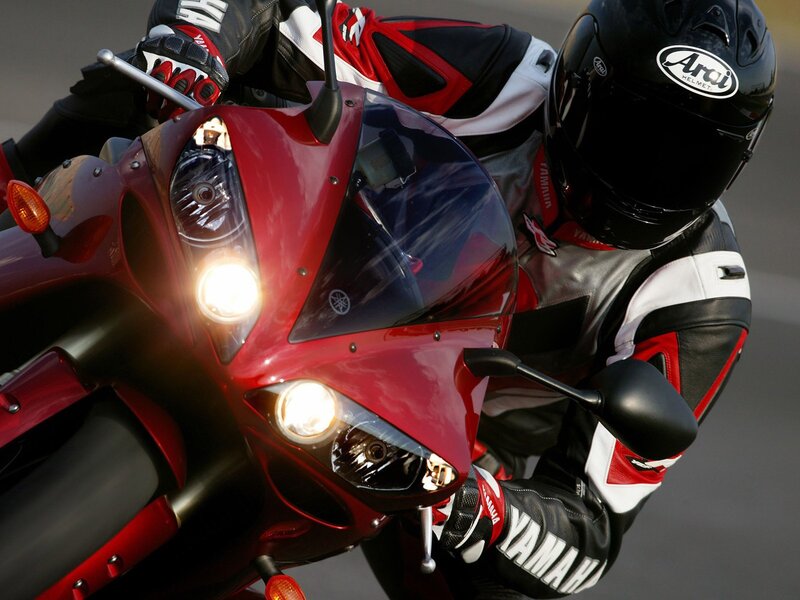 rider on red sport motorcycle