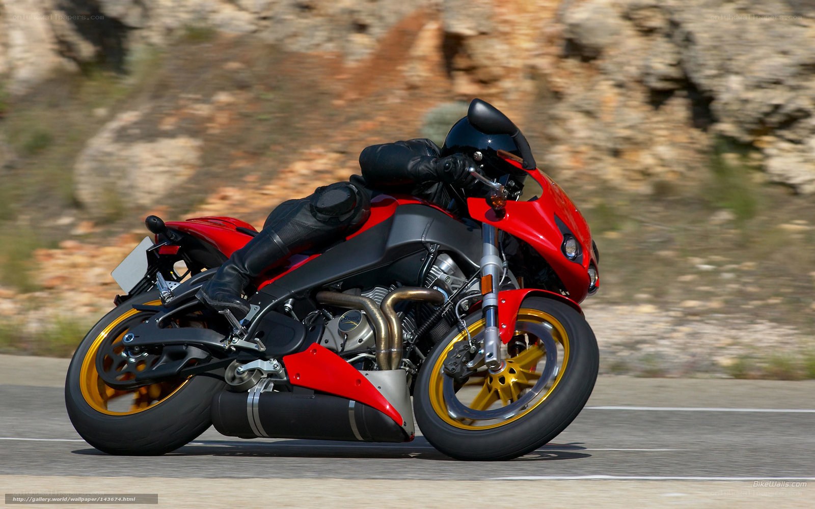 rider on red sport motorcycle