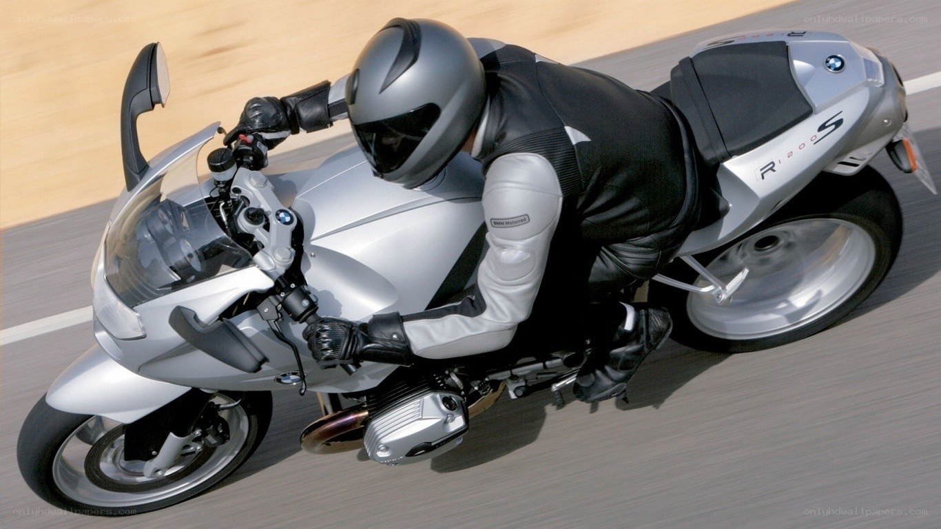 rider on silver motorcycle