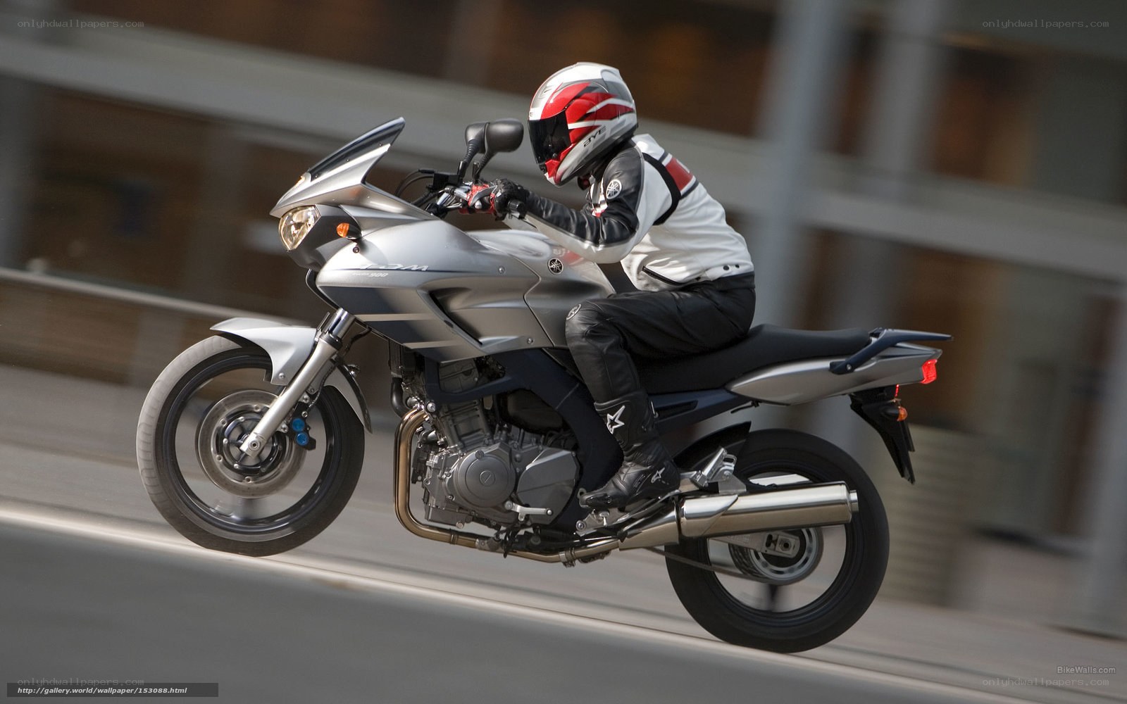 rider on silver motorcycle