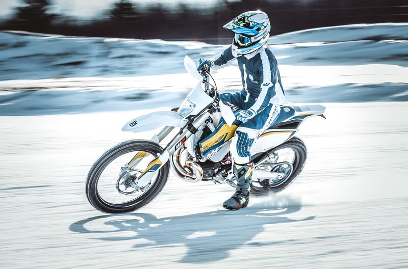 rider on snow bike