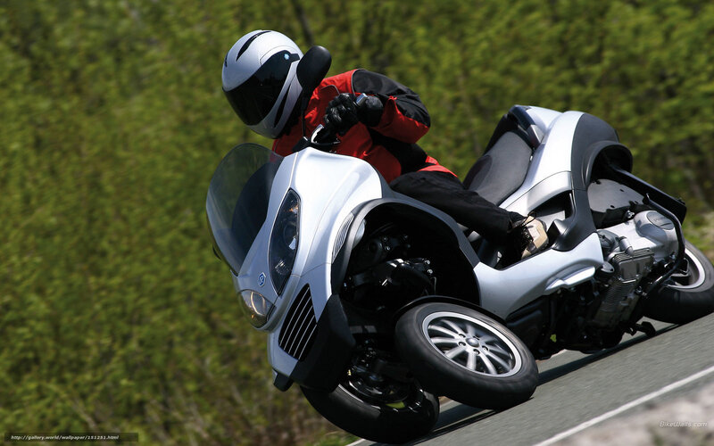 Rider on Three-wheeled Motorcycle — Silver