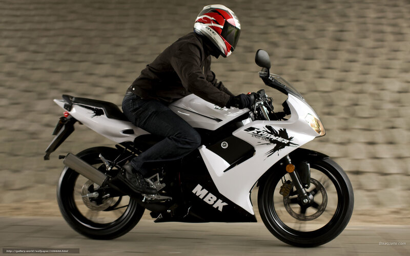 rider on white sport motorcycle