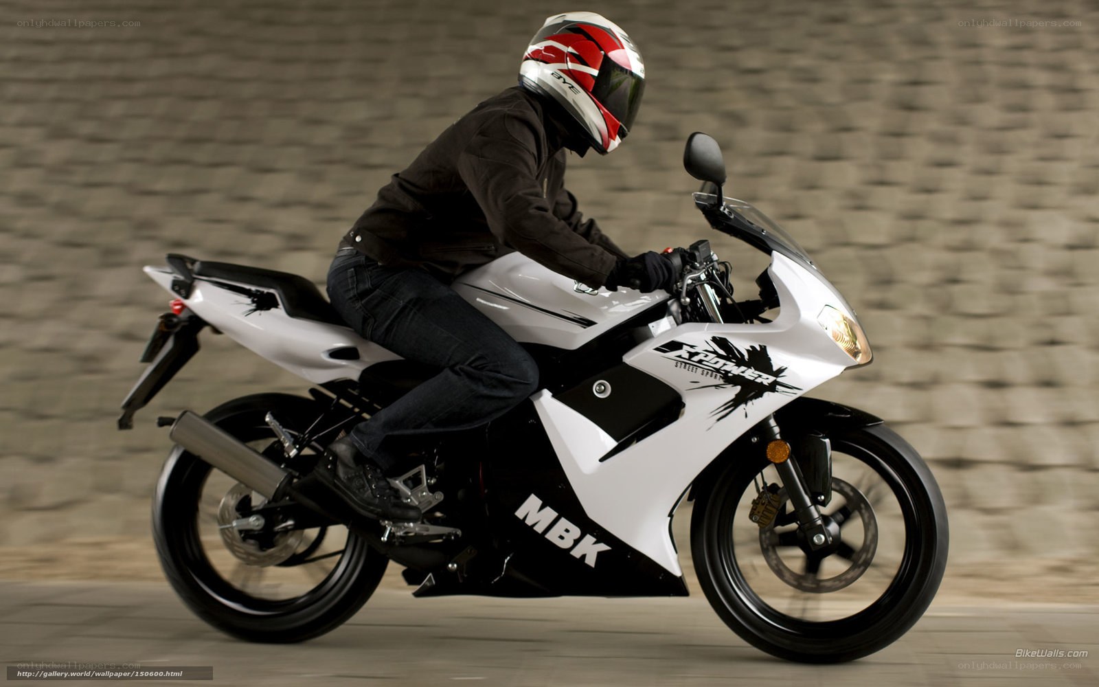 rider on white sport motorcycle
