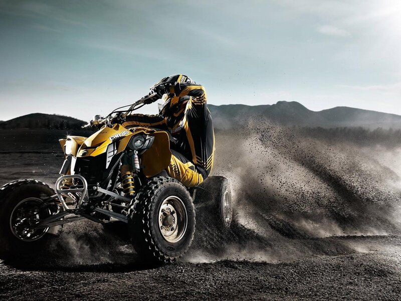 Rider on Yellow ATV — Dynamic, Afternoon, Photograph, Dirt, Mountains