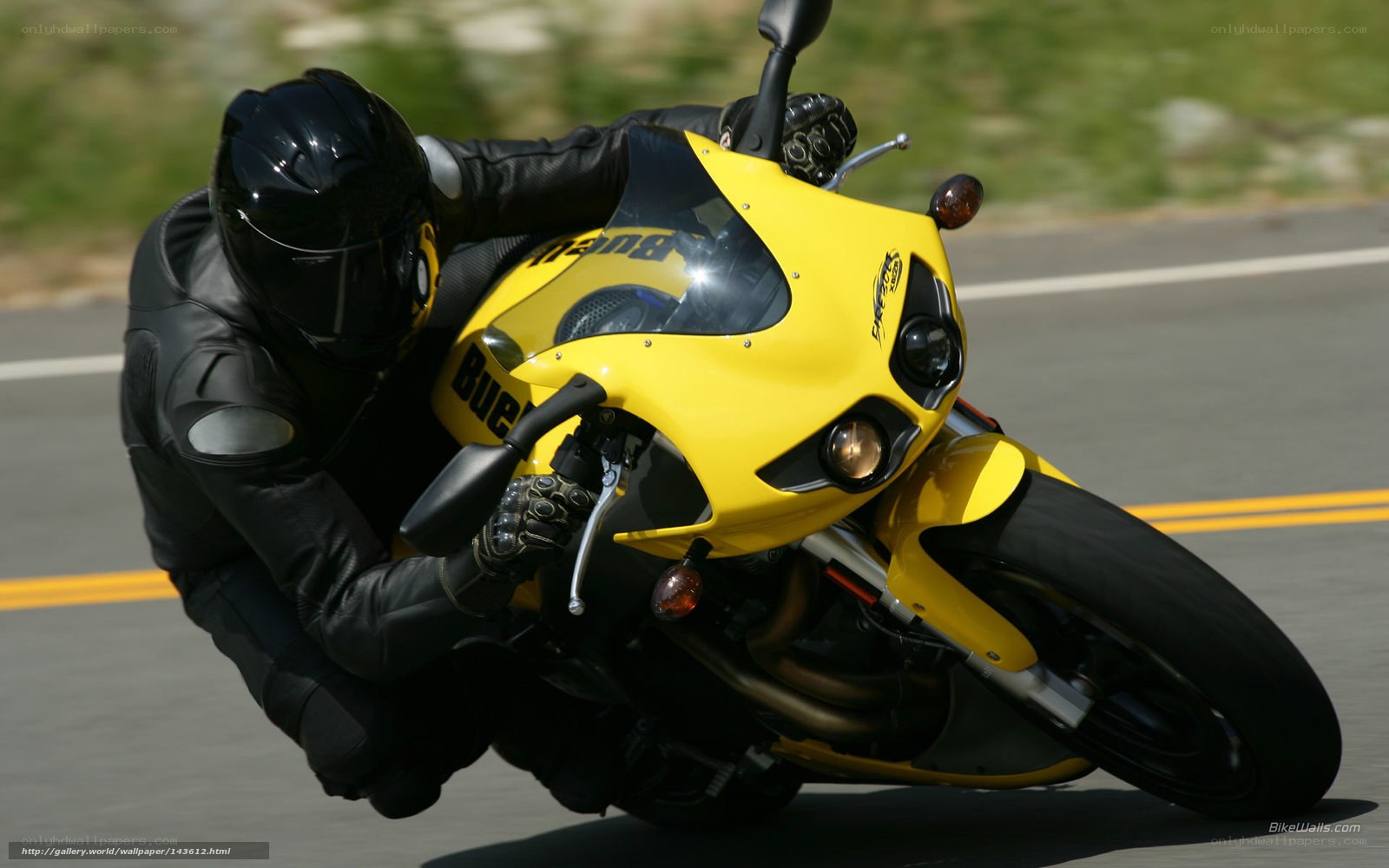 rider on yellow motorcycle