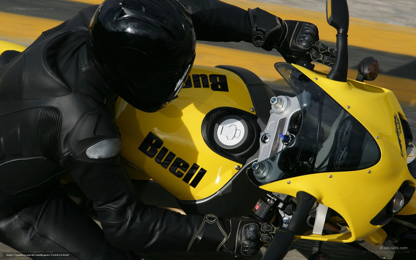 rider on yellow motorcycle